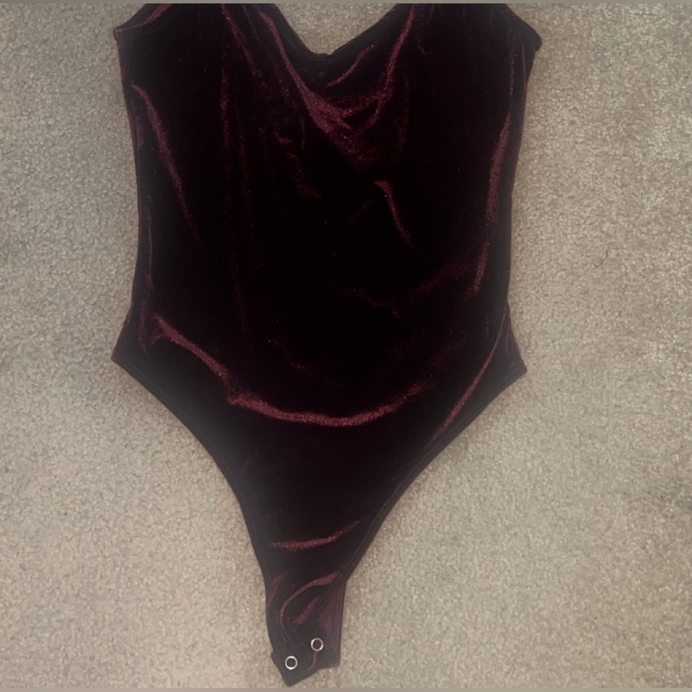 Burgundy body suit with rhinestone straps